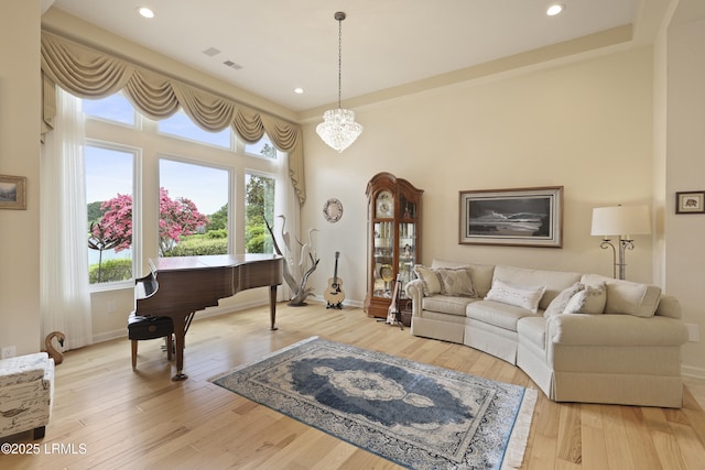102 Lake Somerset Cir, Bluffton, SC 29909 - living room with light wood-style floors, recessed lighting, and a chandelier