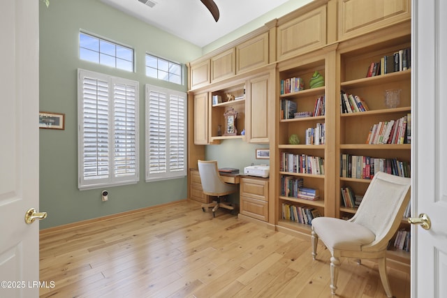 102 Lake Somerset Cir, Bluffton, SC 29909 - office with built in desk, light wood-style floors, and ceiling fan