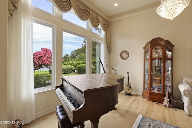102 Lake Somerset Cir, Bluffton, SC 29909 - sitting room with plenty of natural light, light wood finished floors, a chandelier, and recessed lighting