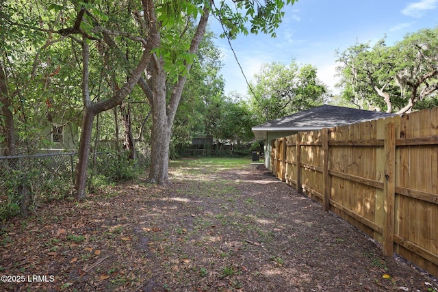 view of yard featuring fence