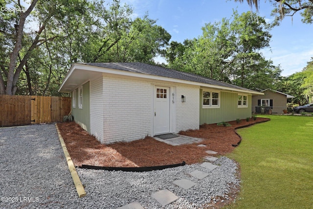 view of outdoor structure with fence