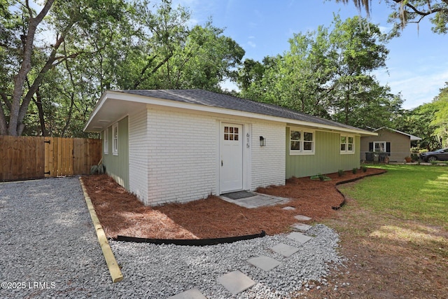 view of outdoor structure featuring fence