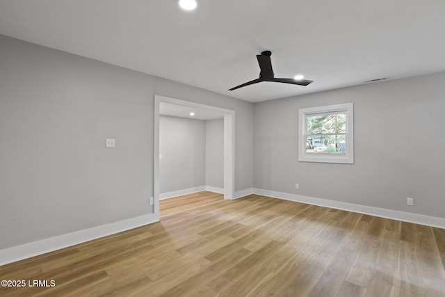 unfurnished bedroom featuring light wood-style floors, baseboards, recessed lighting, and visible vents