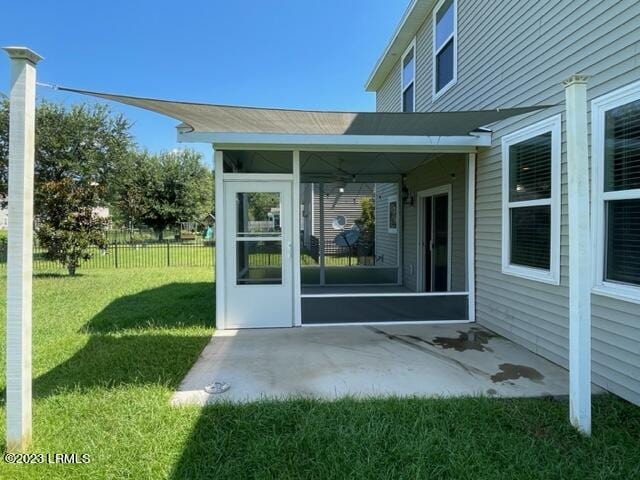 46 Pennyroyal Way, Beaufort, SC 29906 - doorway to property with a yard, fence, and a patio area