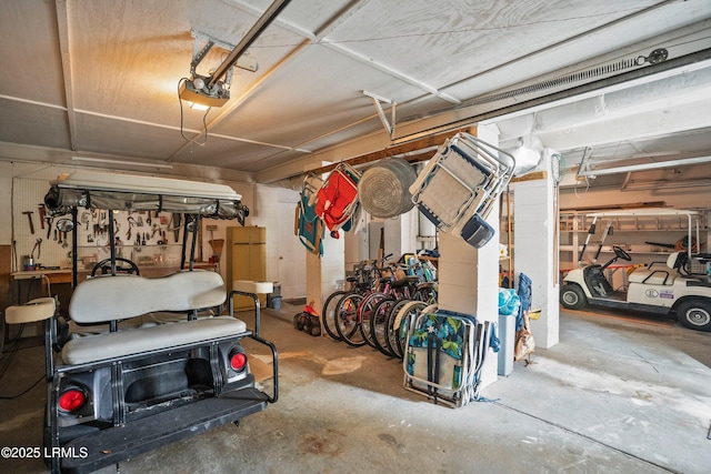 garage featuring a garage door opener