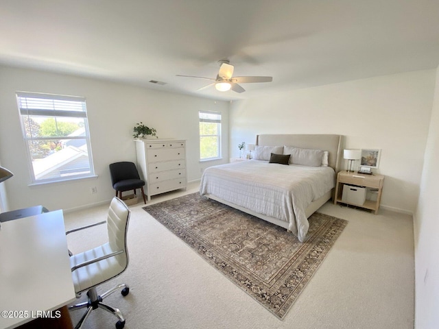 15 6th Ave, Bluffton, SC 29910 - bedroom with carpet, a ceiling fan, baseboards, and a desk