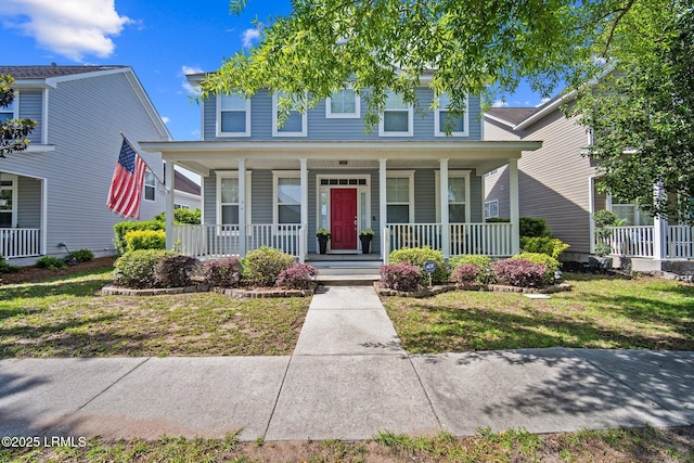 15 6th Ave, Bluffton, SC 29910 - view of front of house featuring a porch and a front yard