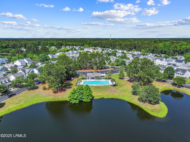15 6th Ave, Bluffton, SC 29910 - aerial overview of property's location with nearby suburban area, a pool area, and a large body of water