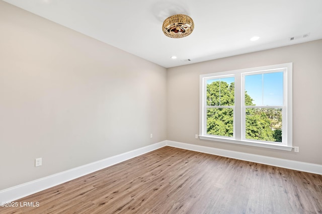 100 Battery Creek Club Dr, Beaufort, SC 29902 - unfurnished room featuring baseboards, wood finished floors, and recessed lighting