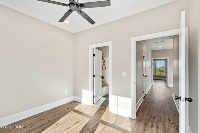 100 Battery Creek Club Dr, Beaufort, SC 29902 - unfurnished bedroom featuring wood finished floors, baseboards, and a ceiling fan
