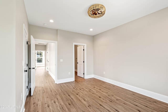 100 Battery Creek Club Dr, Beaufort, SC 29902 - unfurnished bedroom featuring light wood-type flooring, baseboards, and recessed lighting