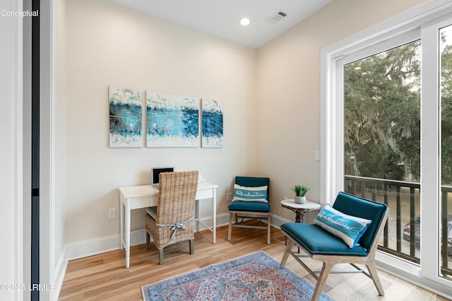 home office featuring hardwood / wood-style flooring