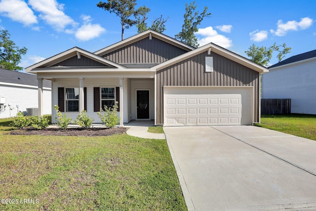 171 Great Bend Dr, Beaufort, SC 29906 - view of front of house featuring driveway, a porch, an attached garage, board and batten siding, and a front yard