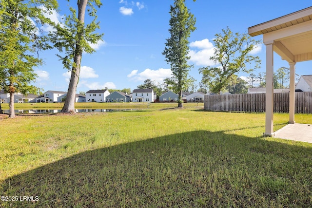 171 Great Bend Dr, Beaufort, SC 29906 - view of yard with fence, a water view, a residential view, and a patio