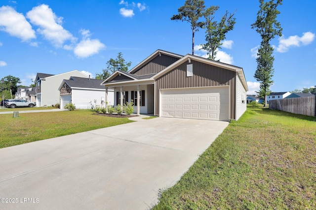 171 Great Bend Dr, Beaufort, SC 29906 - view of front of house featuring driveway, fence, an attached garage, board and batten siding, and a front yard