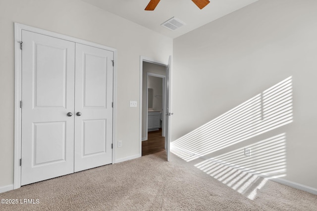 171 Great Bend Dr, Beaufort, SC 29906 - unfurnished bedroom with baseboards, visible vents, a closet, and carpet flooring