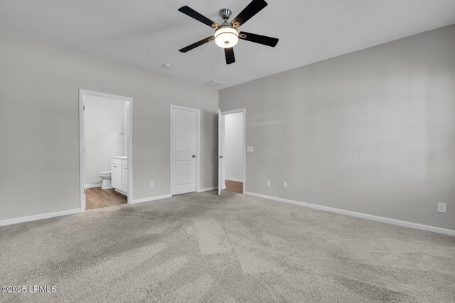 171 Great Bend Dr, Beaufort, SC 29906 - unfurnished bedroom with carpet, ensuite bath, baseboards, and ceiling fan