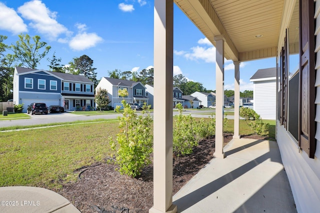 171 Great Bend Dr, Beaufort, SC 29906 - view of patio / terrace with covered porch, a residential view, and a garage