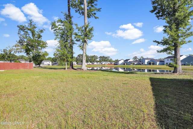 171 Great Bend Dr, Beaufort, SC 29906 - view of yard featuring a residential view, a water view, and fence
