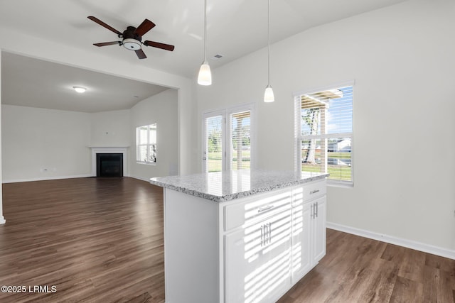 171 Great Bend Dr, Beaufort, SC 29906 - kitchen featuring lofted ceiling, a ceiling fan, dark wood-style flooring, pendant lighting, and white cabinetry