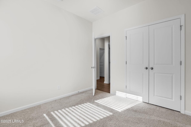 171 Great Bend Dr, Beaufort, SC 29906 - unfurnished bedroom featuring carpet floors, a closet, and baseboards