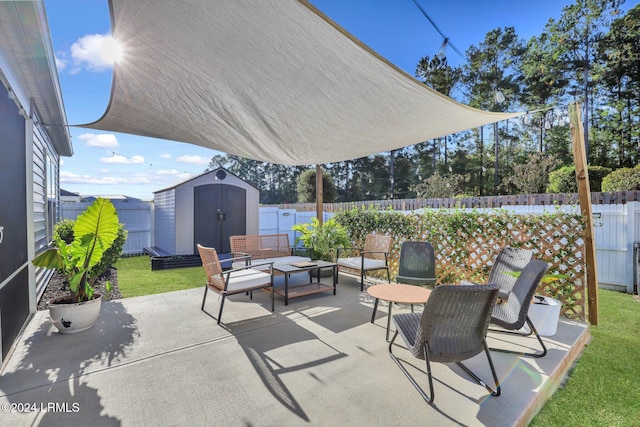 view of patio with a shed and an outdoor hangout area