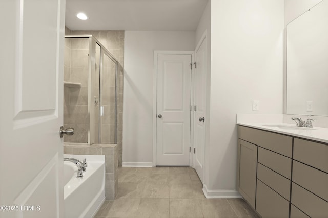 74 Keowee Ln, Beaufort, SC 29906 - bathroom with vanity, a shower stall, a bath, tile patterned flooring, and recessed lighting