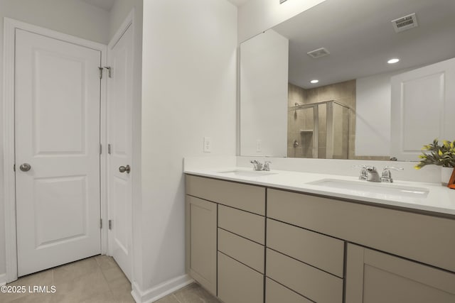74 Keowee Ln, Beaufort, SC 29906 - full bath with double vanity, a shower stall, tile patterned floors, and recessed lighting