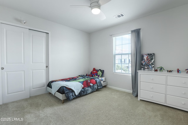 74 Keowee Ln, Beaufort, SC 29906 - bedroom with carpet, a ceiling fan, and a closet