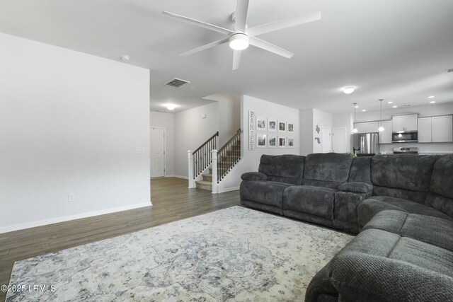 74 Keowee Ln, Beaufort, SC 29906 - living room with wood finished floors, a ceiling fan, stairway, and recessed lighting