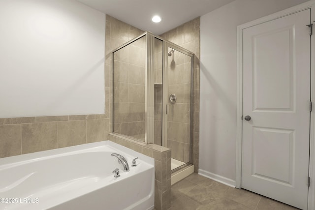 74 Keowee Ln, Beaufort, SC 29906 - bathroom with a bath, a stall shower, and recessed lighting