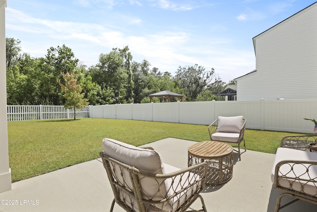 74 Keowee Ln, Beaufort, SC 29906 - fenced backyard with a patio area