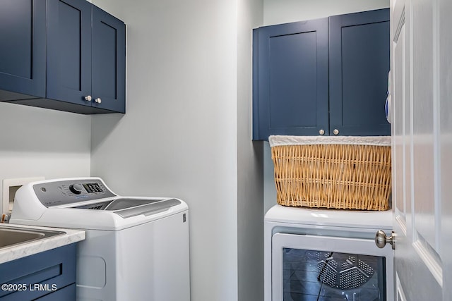 1348 Rowland Dr, Saint Helena Island, SC 29920 - clothes washing area with separate washer and dryer, sink, and cabinets