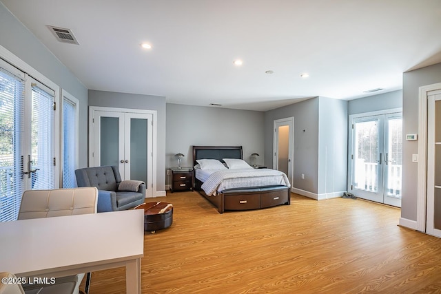1348 Rowland Dr, Saint Helena Island, SC 29920 - bedroom with french doors, access to exterior, and light hardwood / wood-style floors