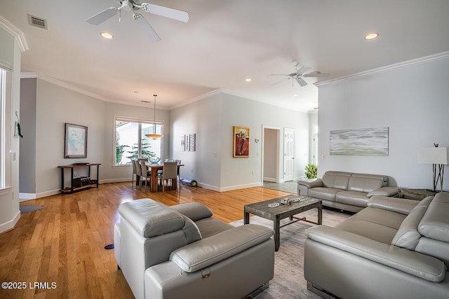 1348 Rowland Dr, Saint Helena Island, SC 29920 - living room featuring ornamental molding, ceiling fan, and light hardwood / wood-style floors