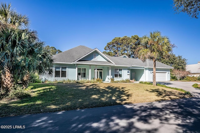 1348 Rowland Dr, Saint Helena Island, SC 29920 - view of front of property with a garage and a front lawn