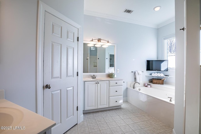 1348 Rowland Dr, Saint Helena Island, SC 29920 - bathroom featuring ornamental molding, vanity, tile patterned flooring, and a bathtub