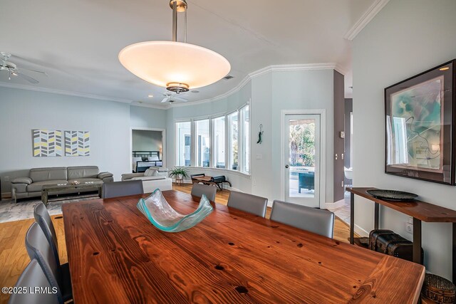 1348 Rowland Dr, Saint Helena Island, SC 29920 - dining space with ornamental molding, ceiling fan, and light hardwood / wood-style flooring