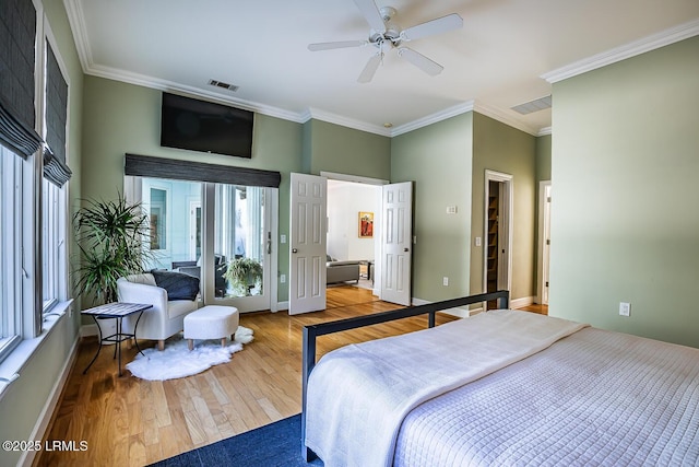 1348 Rowland Dr, Saint Helena Island, SC 29920 - bedroom featuring hardwood / wood-style flooring, crown molding, and ceiling fan