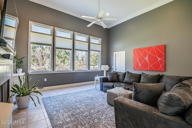1348 Rowland Dr, Saint Helena Island, SC 29920 - living room featuring crown molding, ceiling fan, a high end fireplace, and light tile patterned floors