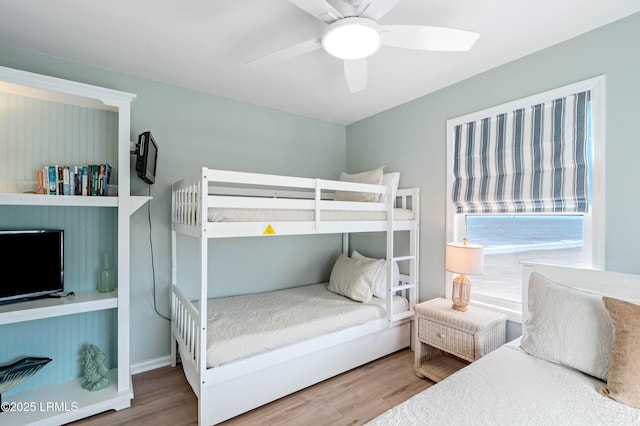 108 Harbor Dr N, Harbor Island, SC 29920 - bedroom with wood finished floors and ceiling fan