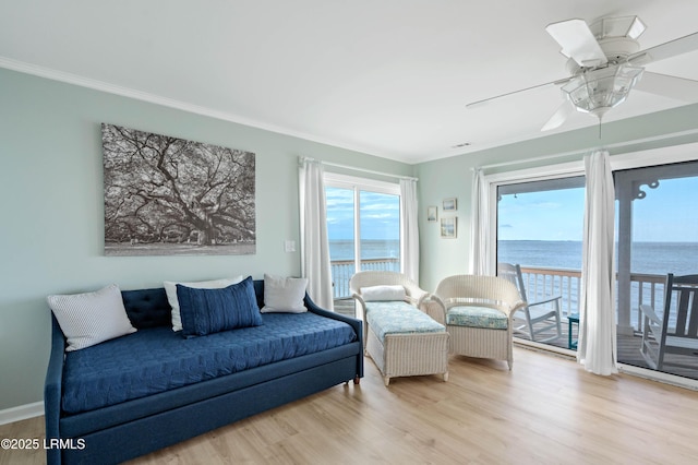 108 Harbor Dr N, Harbor Island, SC 29920 - living room with a water view, ornamental molding, wood finished floors, and ceiling fan