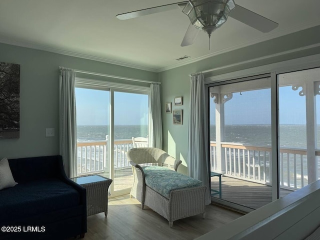 108 Harbor Dr N, Harbor Island, SC 29920 - bedroom with access to exterior, a water view, wood finished floors, ornamental molding, and a ceiling fan