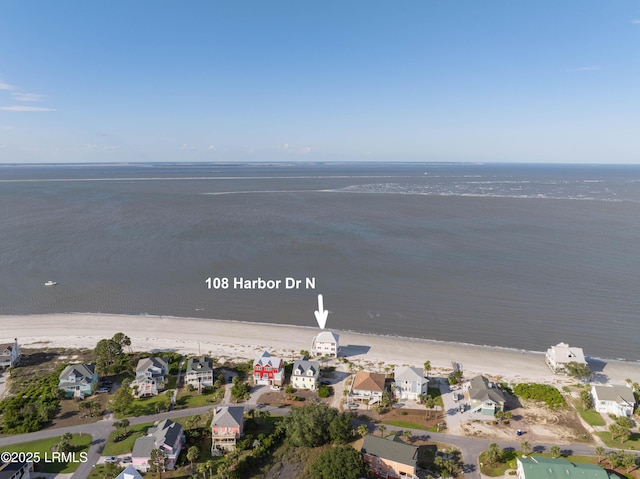 108 Harbor Dr N, Harbor Island, SC 29920 - aerial overview of property's location with expansive beach and nearby suburban area
