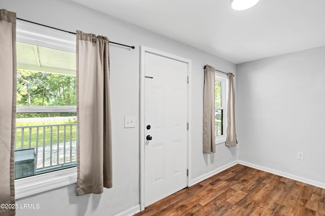 7058 Roseida Rd, Beaufort, SC 29906 - entrance foyer with wood finished floors and baseboards