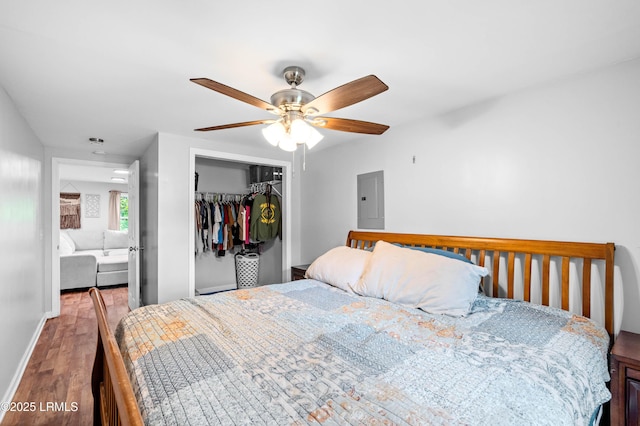 7058 Roseida Rd, Beaufort, SC 29906 - bedroom featuring electric panel, wood finished floors, a closet, and ceiling fan