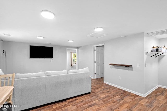 7058 Roseida Rd, Beaufort, SC 29906 - living area featuring attic access and wood finished floors
