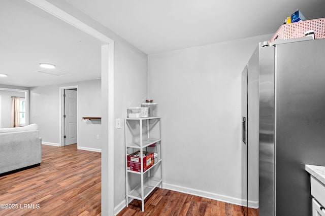 7058 Roseida Rd, Beaufort, SC 29906 - kitchen featuring stainless steel refrigerator with ice dispenser, wood finished floors, and light countertops