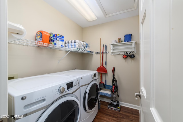 washroom with separate washer and dryer and dark hardwood / wood-style flooring