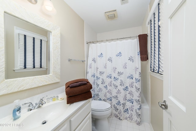 full bathroom with shower / bathtub combination with curtain, vanity, toilet, and tile patterned flooring